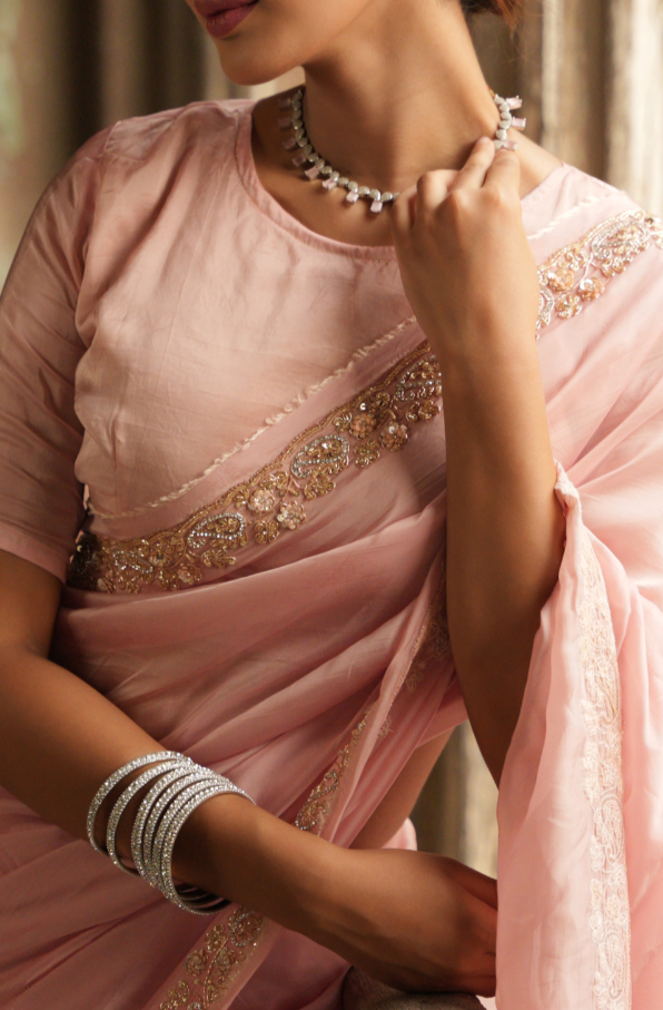 Whispers of Elegance: Light Peach Organza Silk Saree with Zardozi Buti & Grand Border