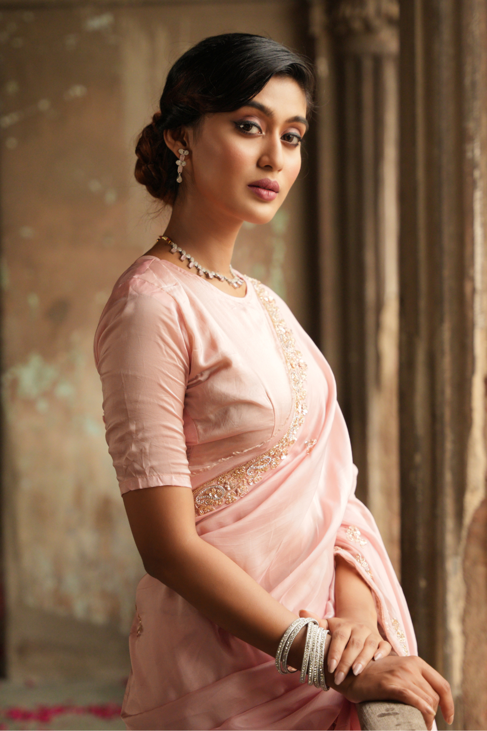 Whispers of Elegance: Light Peach Organza Silk Saree with Zardozi Buti & Grand Border