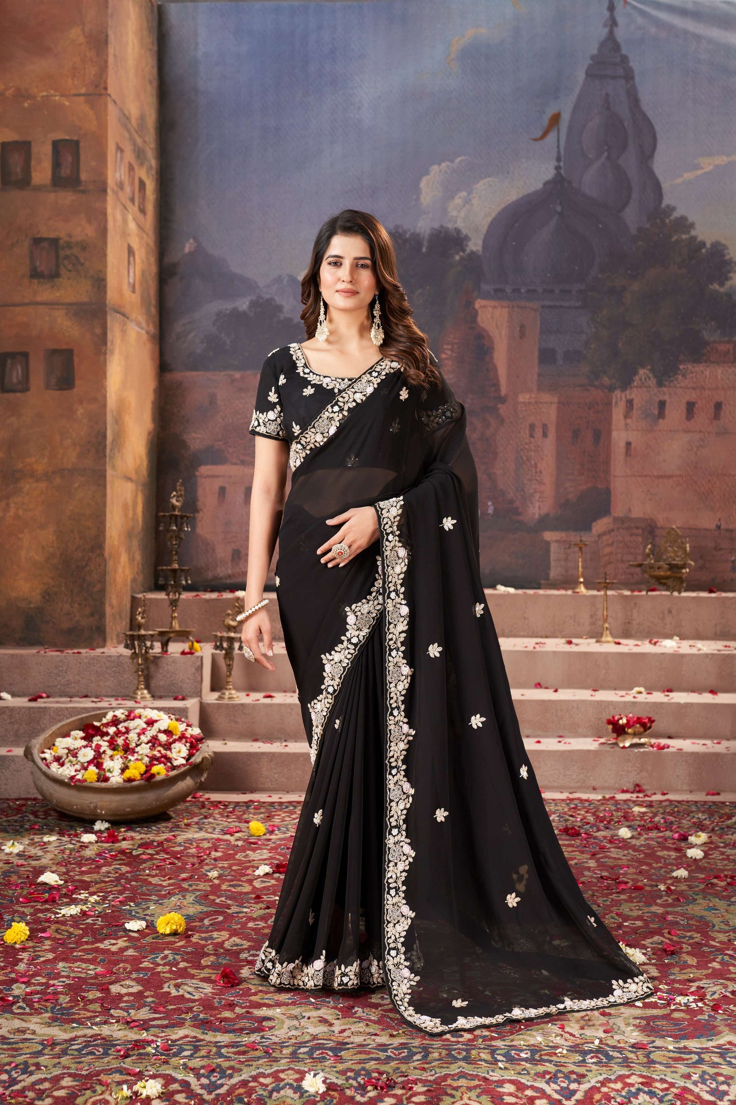 Chic Black Georgette Saree with Hand Embroidery Details