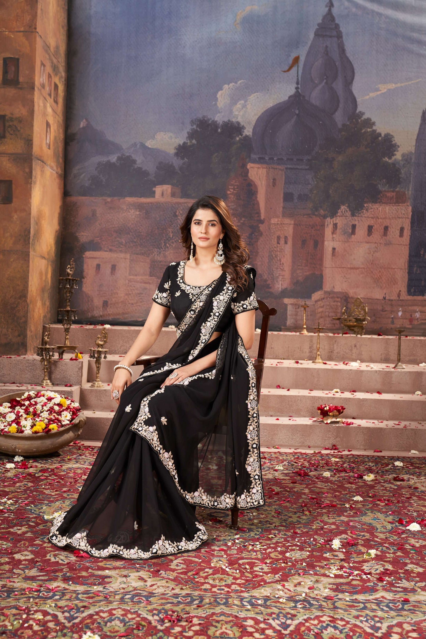 Chic Black Georgette Saree with Hand Embroidery Details