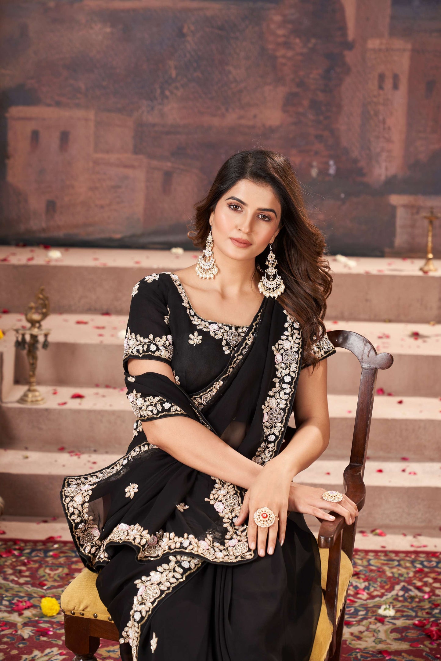 Chic Black Georgette Saree with Hand Embroidery Details