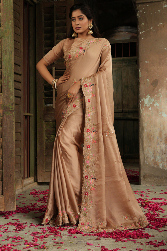 Golden Odyssey: Beige Organza Satin Saree with Majestic Peacock Zardozi Embroidery