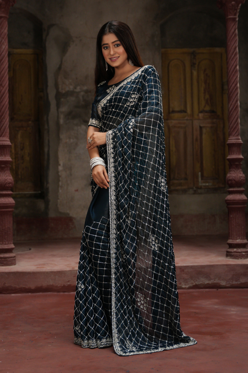 Captivating Turquoise Blue Saree with Heavy Checks Jaal & Buta on Tissue Fabric