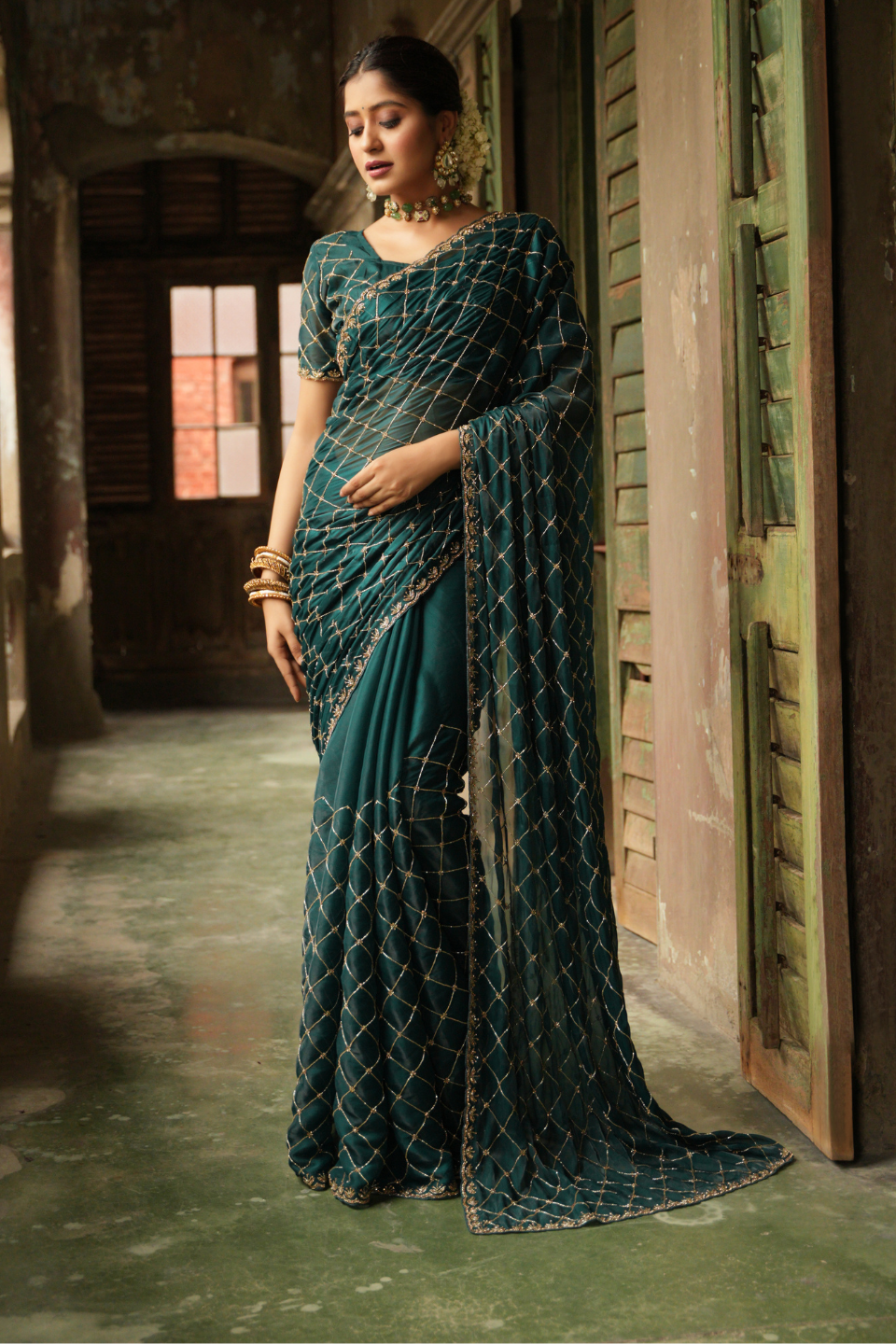 Oceanic Elegance: Turquoise Green Tissue Saree with Checks Jaal & Matdan-Zarkan Border