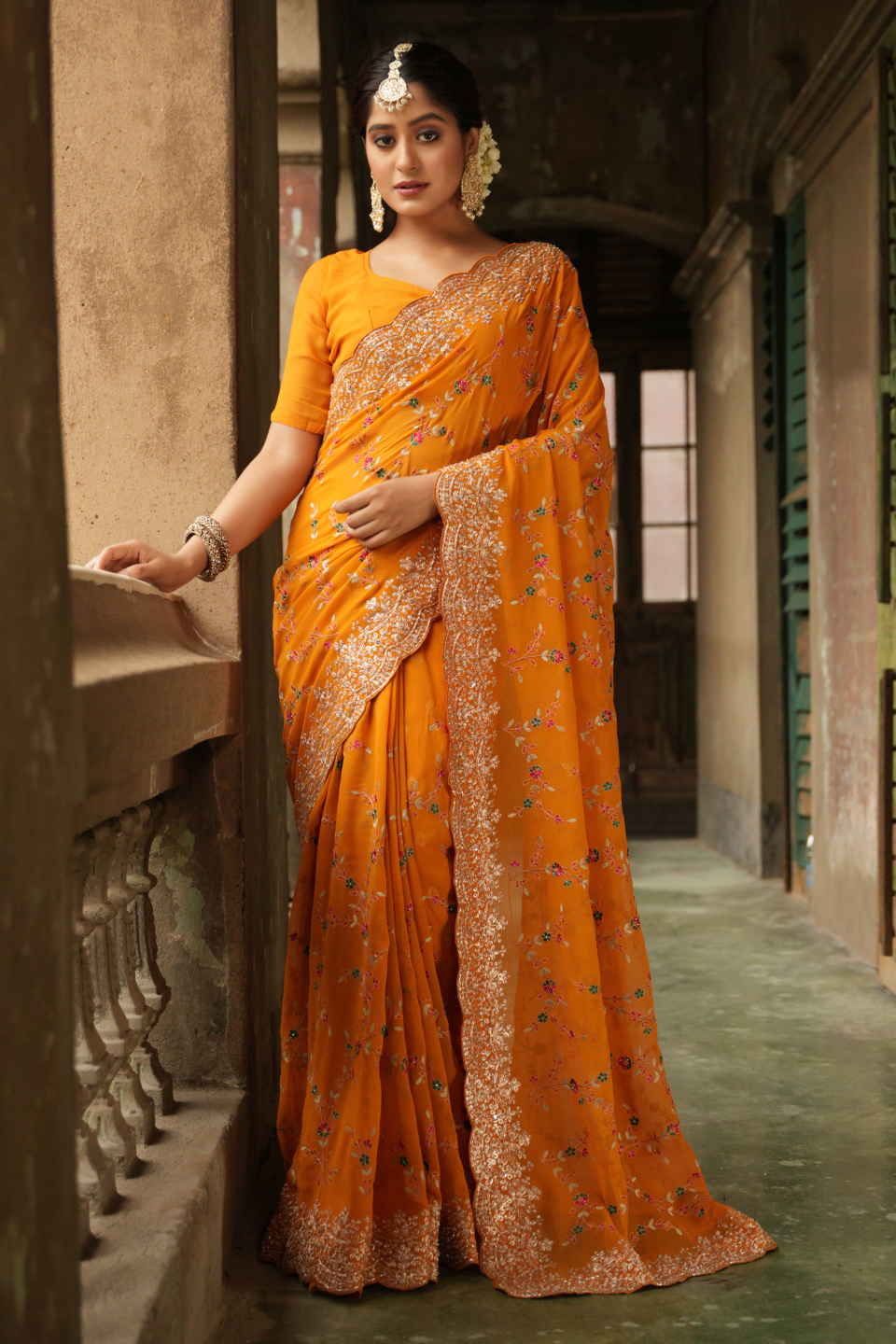 Golden Radiance: Mustard Yellow Georgette Saree with Zari Border & Resham Jaal