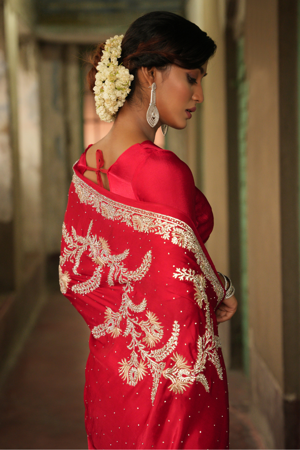 Scarlet Symphony: Red Chinnon Satin Saree with Zardozi & Zarkan Embellishments