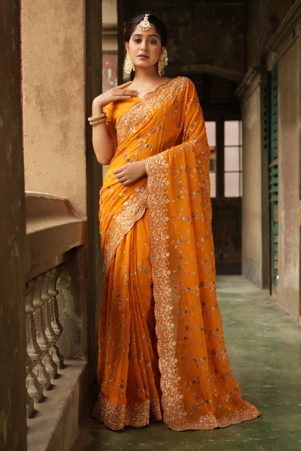 Golden Radiance: Mustard Yellow Georgette Saree with Zari Border & Resham Jaal