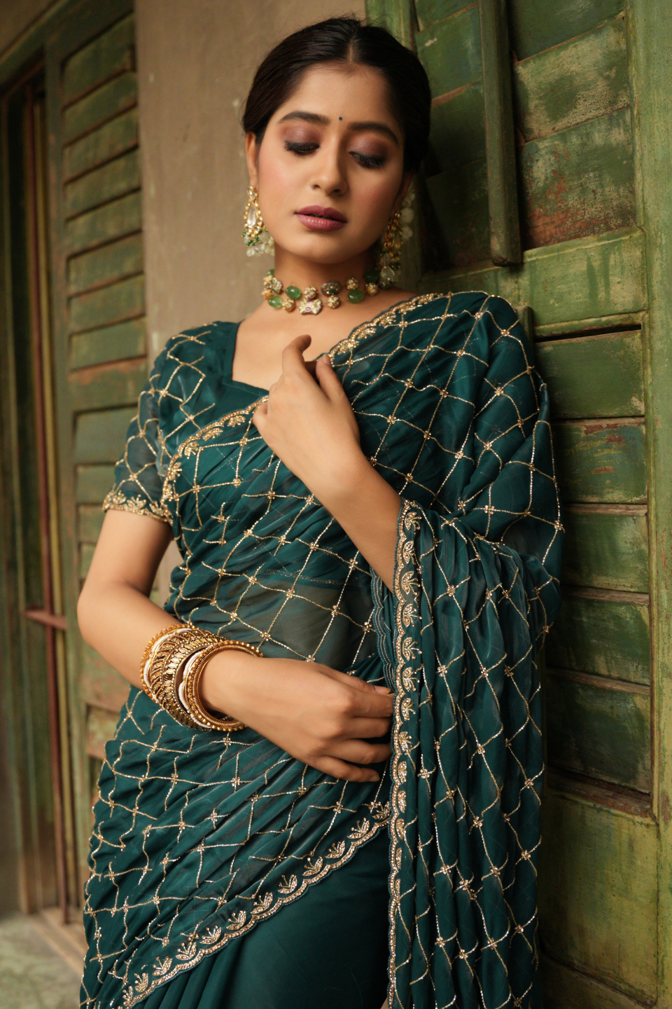 Oceanic Elegance: Turquoise Green Tissue Saree with Checks Jaal & Matdan-Zarkan Border