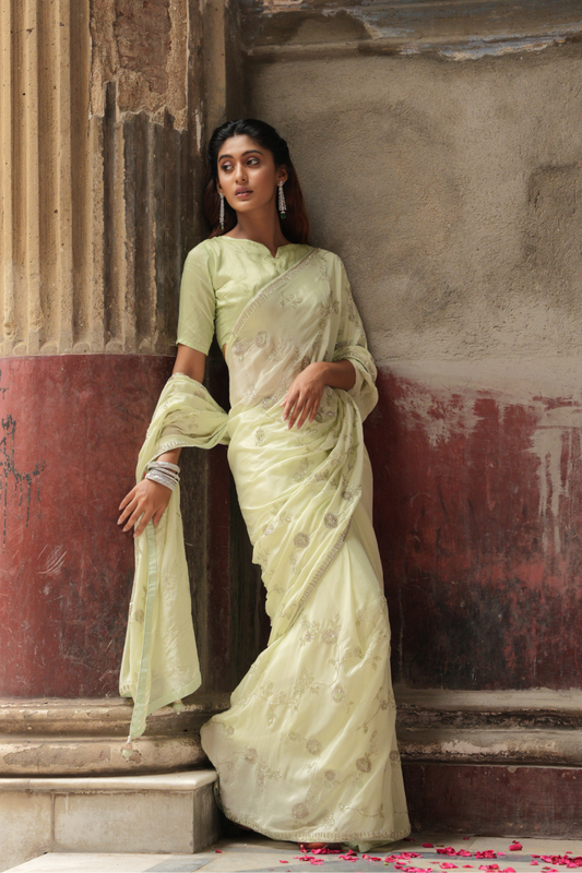 Whispers of Nature: Pastel Lime Green Chinnon Crape Saree Adorned with Ethereal Jaal & Katdana