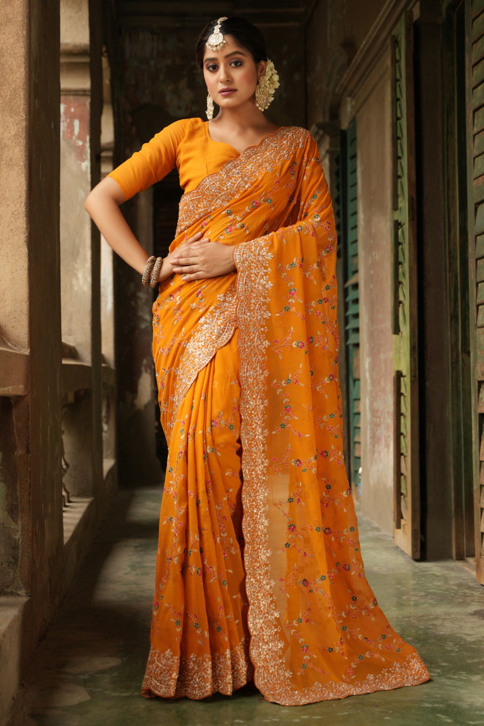 Golden Radiance: Mustard Yellow Georgette Saree with Zari Border & Resham Jaal