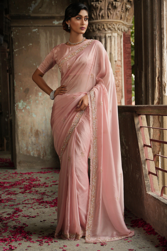 Whispers of Elegance: Light Peach Organza Silk Saree with Zardozi Buti & Grand Border