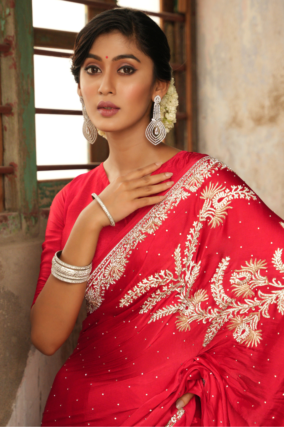 Scarlet Symphony: Red Chinnon Satin Saree with Zardozi & Zarkan Embellishments