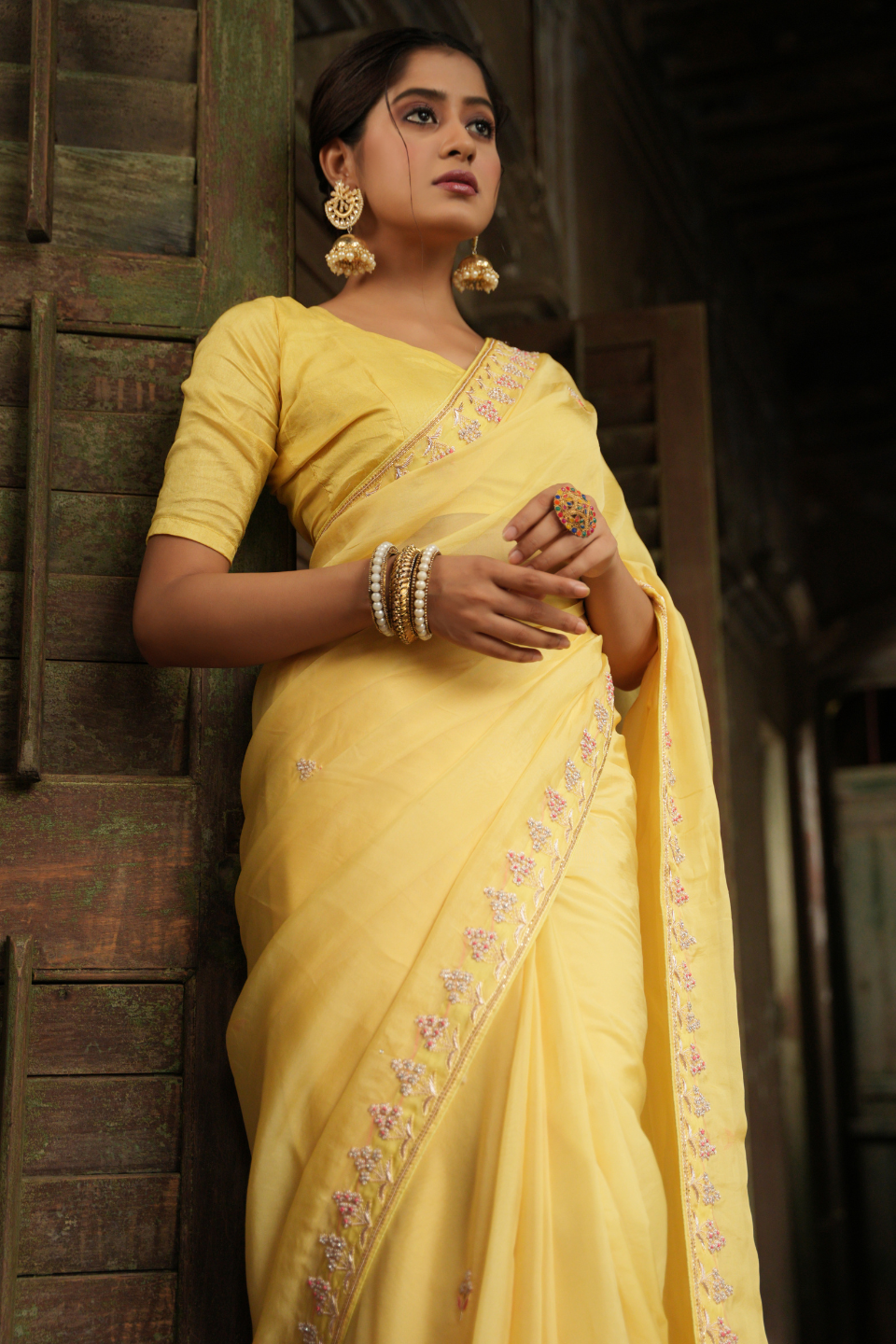 Sunlit Grace: Lemon Yellow Organza Saree with Alluring Buti & Nine Yard Embellishments