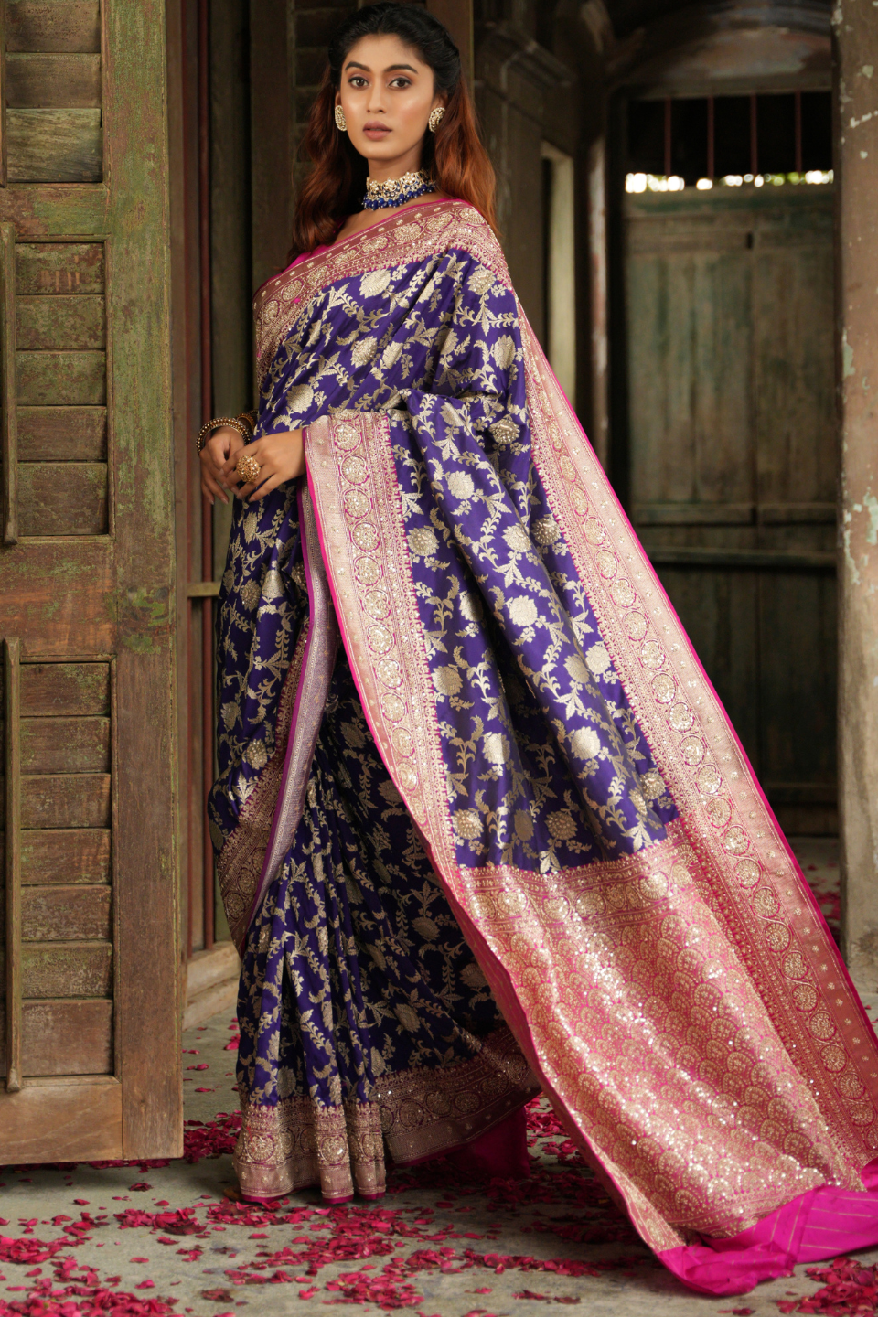 Royal Tapestry: Purple-Blue Banarasi Silk Saree with Rani Border & Zardozi Embellishments