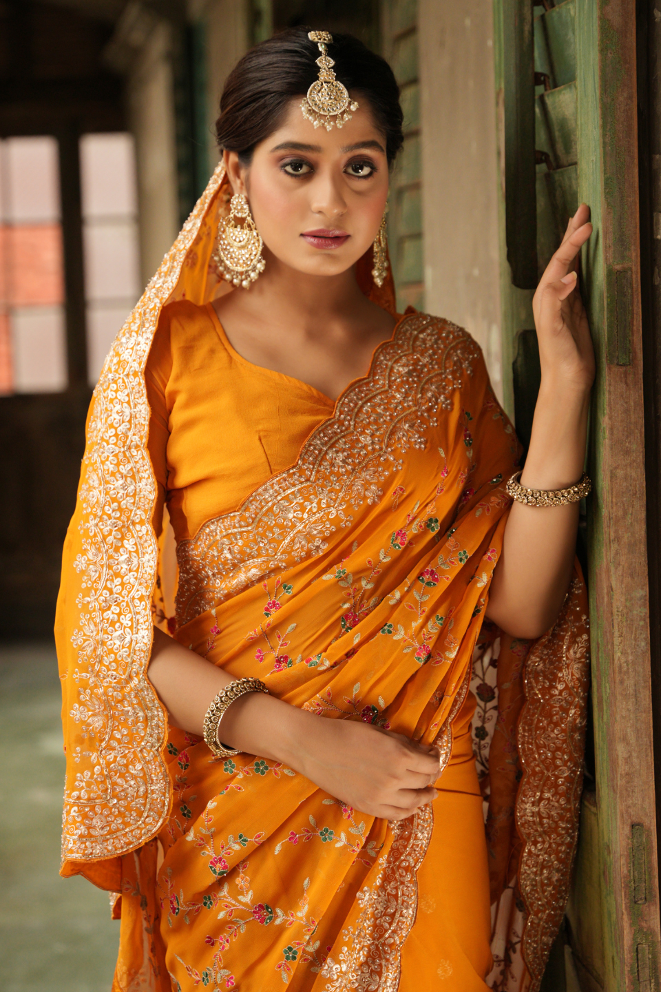 Golden Radiance: Mustard Yellow Georgette Saree with Zari Border & Resham Jaal