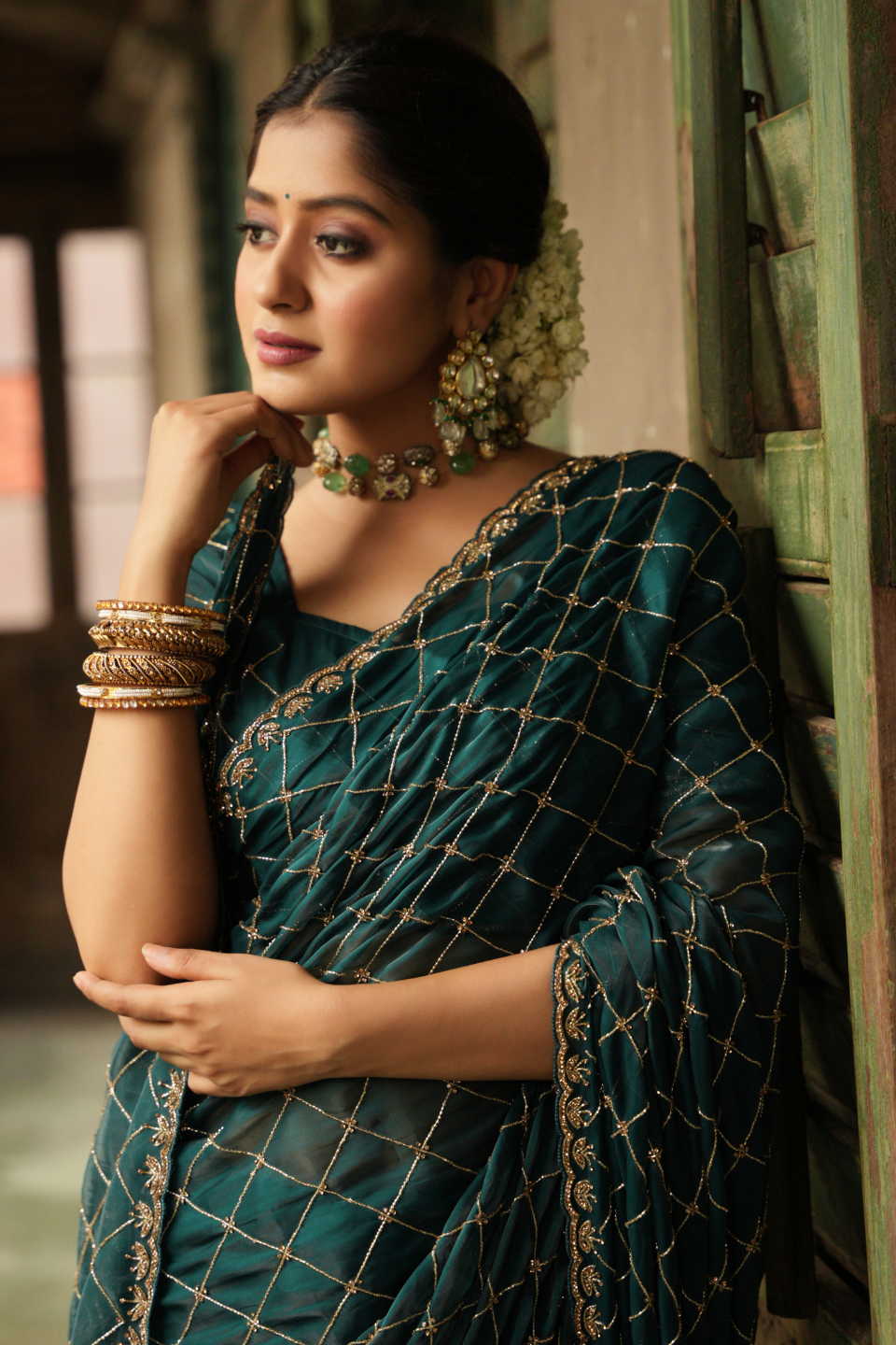 Oceanic Elegance: Turquoise Green Tissue Saree with Checks Jaal & Matdan-Zarkan Border