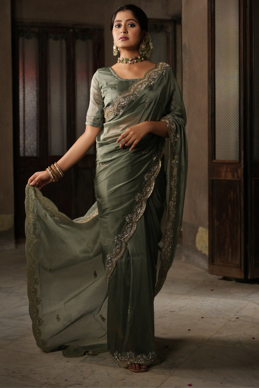 Sage Serenade: Tissue Organza Saree with Lustrous Buti & Majestic Nine Yard Border