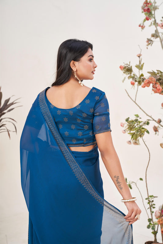 Enchanting Turquoise Blue Georgette Saree with Sarvoski Stone Border