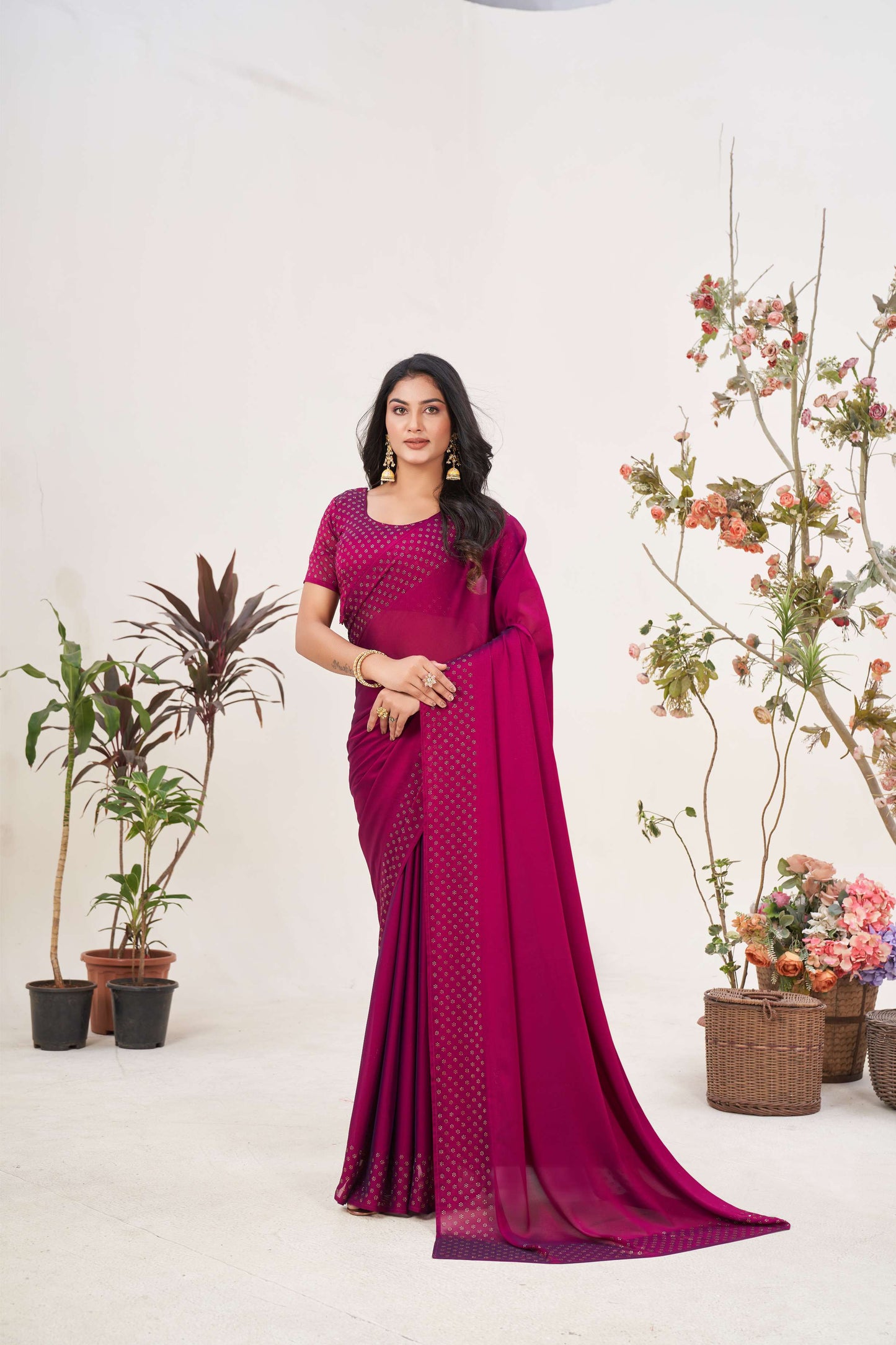 Chic Wine Georgette Saree with Sarvoski Stone Border