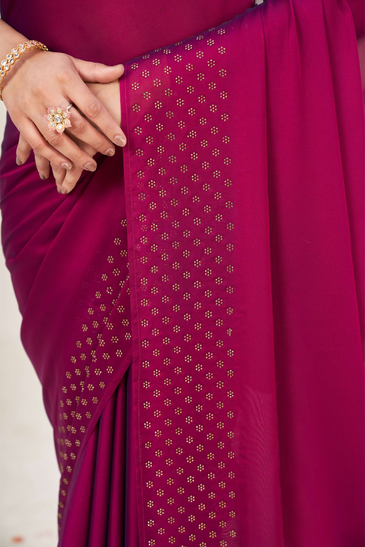 Chic Wine Georgette Saree with Sarvoski Stone Border