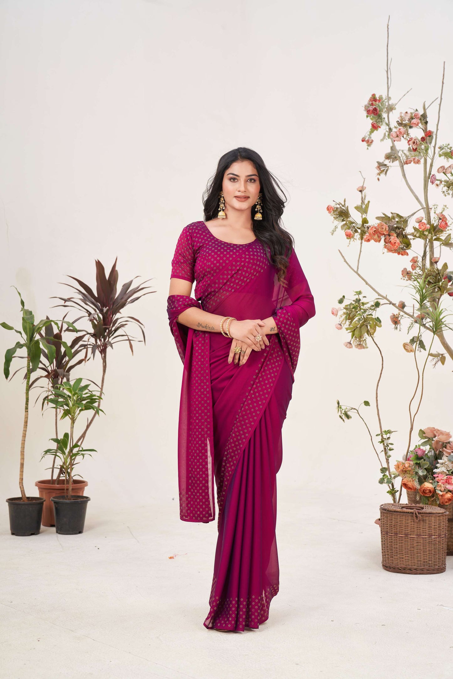 Chic Wine Georgette Saree with Sarvoski Stone Border