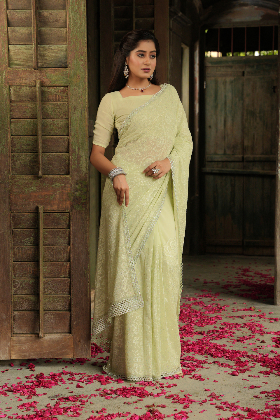 Verdant Charm: Lime Green Georgette Saree with Exquisite Lucknowi Work & Cutwork Border