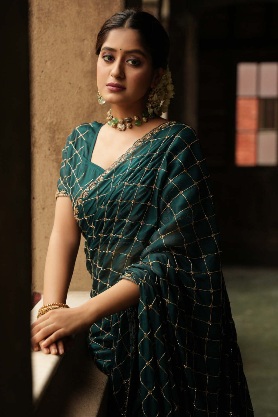 Oceanic Elegance: Turquoise Green Tissue Saree with Checks Jaal & Matdan-Zarkan Border