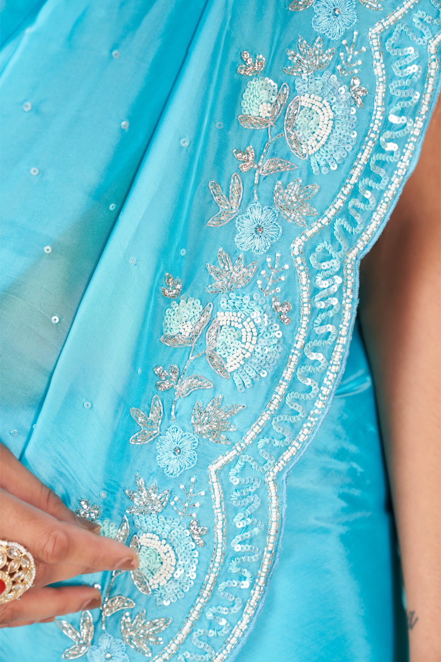 Captivating Firozi Tissue Organza Saree with Sequins and Zardozi