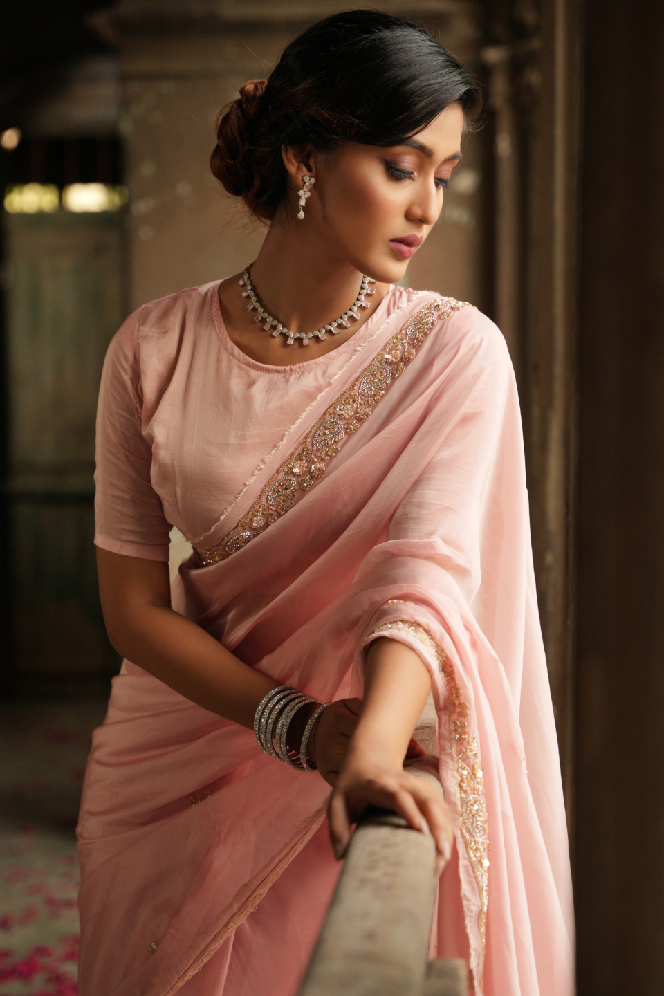 Whispers of Elegance: Light Peach Organza Silk Saree with Zardozi Buti & Grand Border