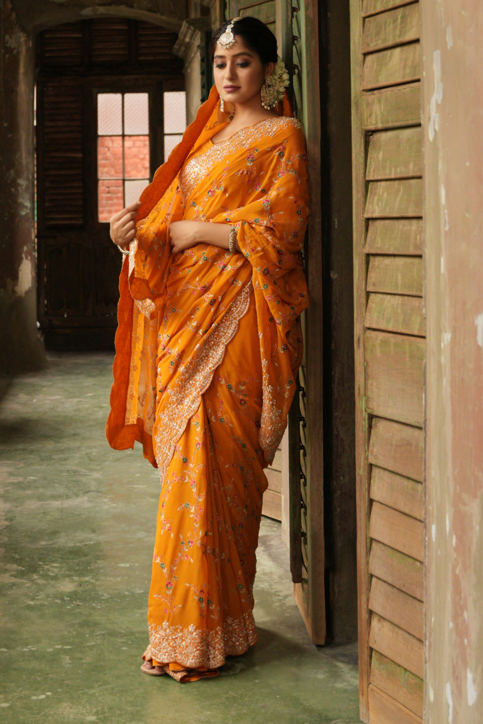 Golden Radiance: Mustard Yellow Georgette Saree with Zari Border & Resham Jaal